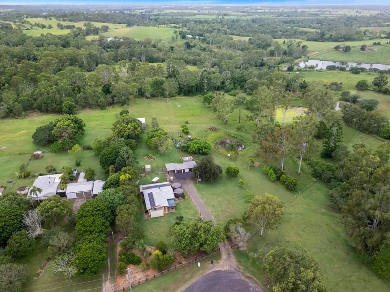 5.93 ACRES OF UNDULATING LAND WITH BRICK HOME TUCKED AWAY AT THE END OF A CUL-DE-SAC - 28 MINUTES TO BUNDABERG CBD AND 15 MINUTES TO GIN GIN.