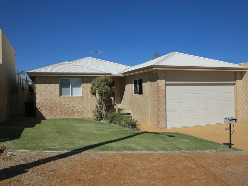 A HOME & LOCATION NOT TO HESITATE ON!