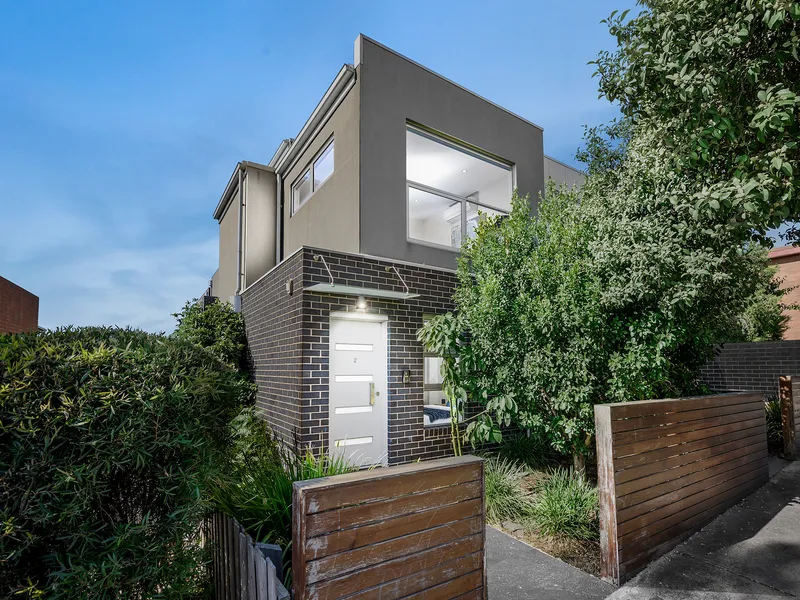 Light-filled townhouse offers pristine interiors, great location