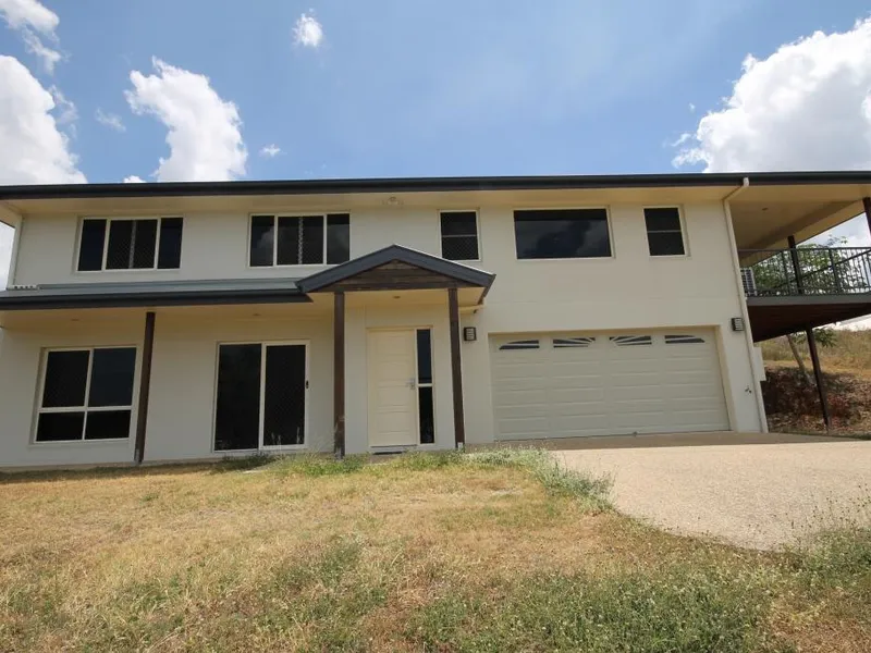 AN AS NEW DOUBLE STOREY BRICK HOME WITH INTERNAL STAIRS - 4 BEDROOMS - 2 BATHROOMS - LARGE COVERED TIMBER DECK - STUNNING VIEWS.