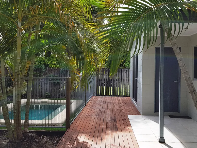 Detached 2 bedroom unit with pool is within easy walking distance to shops & beachfront.