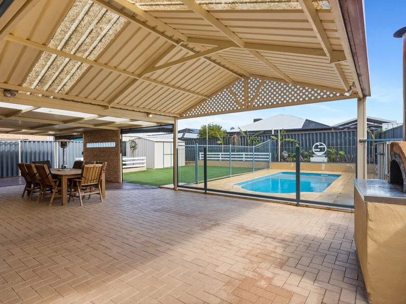 ENTERTAIN IN YEAR-ROUND COMFORT WITH THIS SENSATIONAL FAMILY HOME WITH POOL