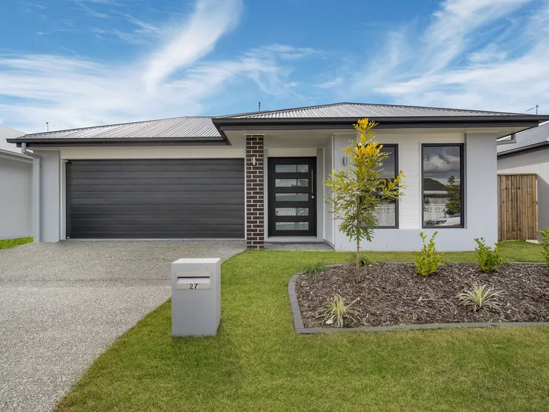 Discover Modern Elegance and Family Comfort in South Maclean!