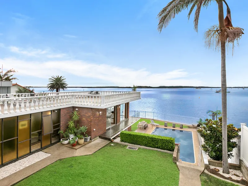 Expansive home on a street to waterfront block