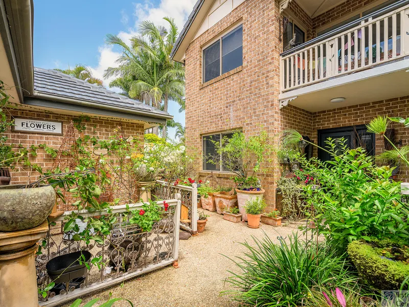 BEAUTIFUL TWO-STORY HOME WITH A COTTAGE CHARM