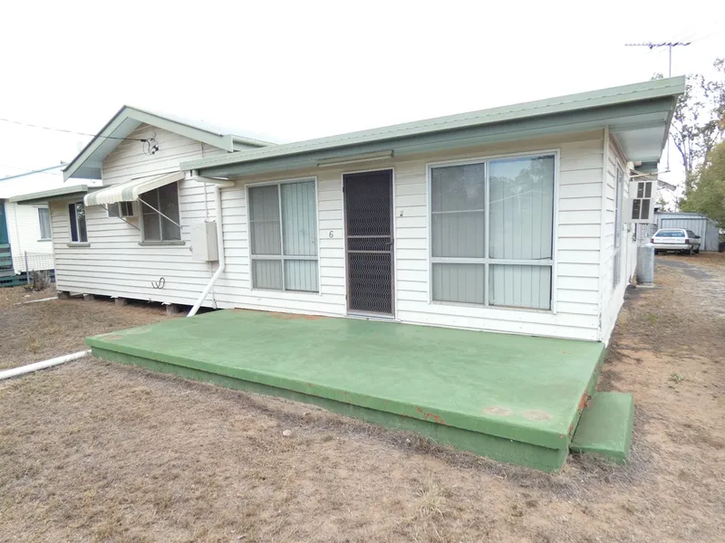 Solid Timber Home With Great Shed