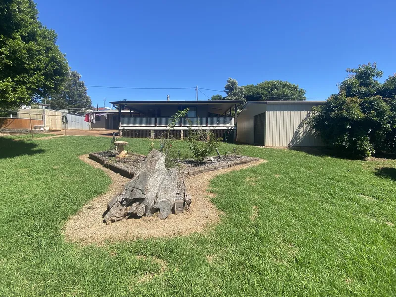 Quality home on half an acre with sheds and views!