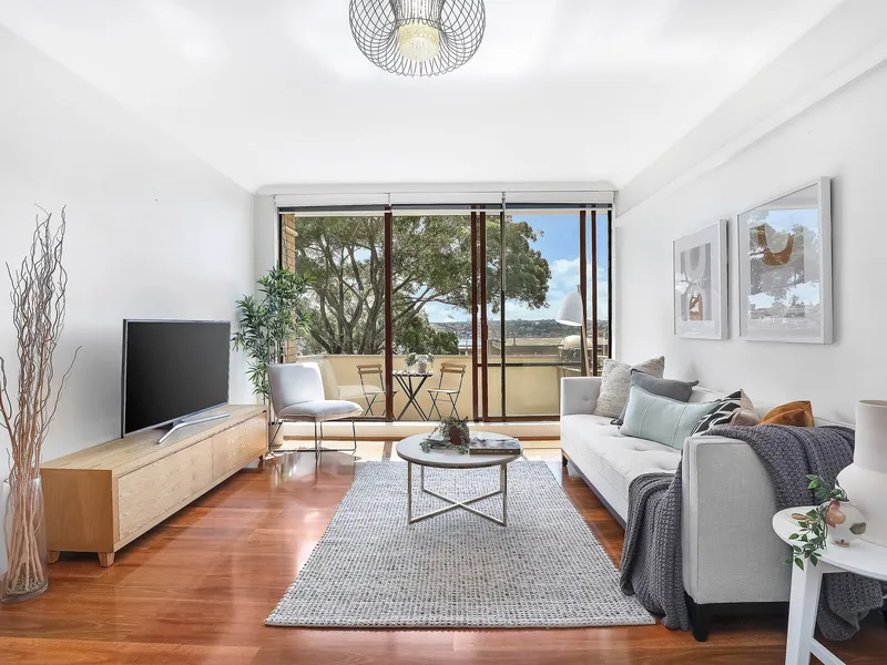 Leafy Water Views from a Top Floor Apartment