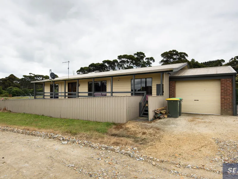 Right in town with rural views!