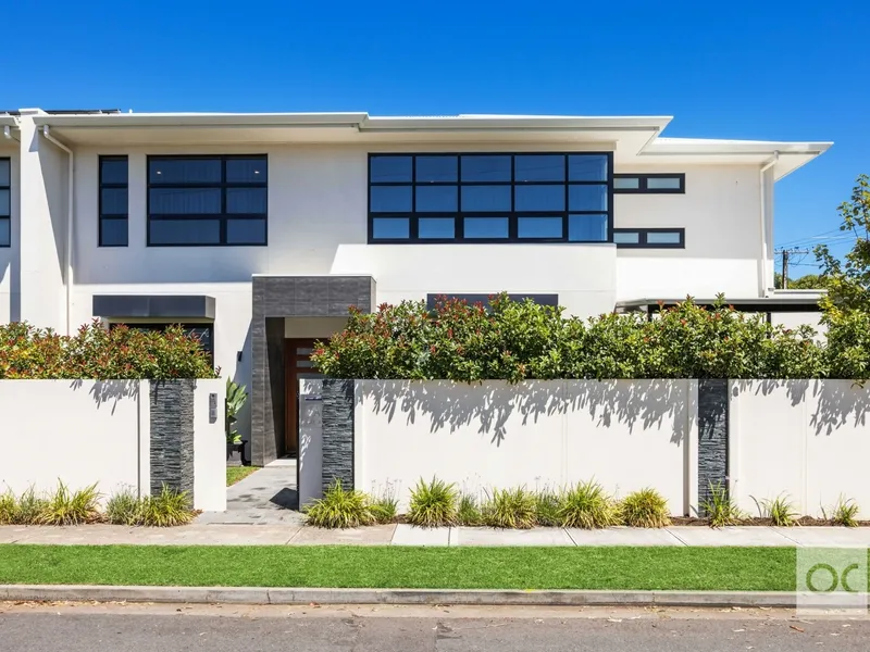 The beachy lifestyle, lifted to another level on a corner plot in a prized school zone.