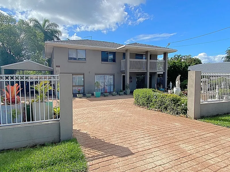 Large dual-living home with development potential!