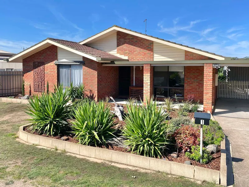 Double gable brick! Oodles of street appeal! Easy Care Low Maintenance! Quiet Location Move in Ready Spacious 3 Br 2 Bth 2 Living Open Concept!