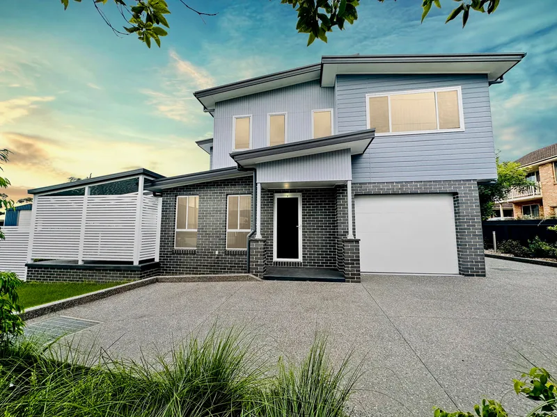 Brand New Three Bedroom Townhouse With Garage + Parking Space