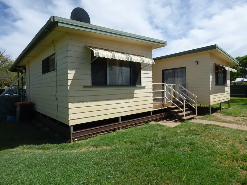 HOUSE WITH LARGE DECK AND LOCK UP GARAGE
