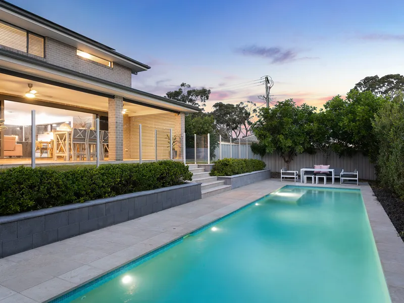 Awe-inspiring residence with luxurious pool on corner block