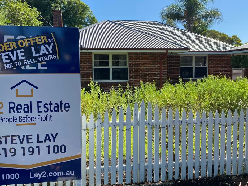 Red brick 1950s home on 487sqm block