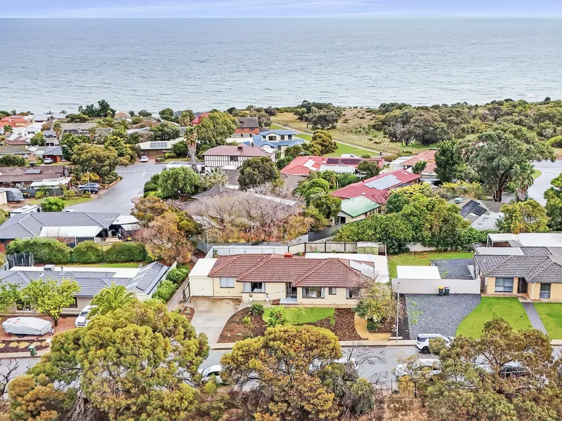 Beachside Opportunity: Spacious Family Home with a Cricket-Friendly Backyard!