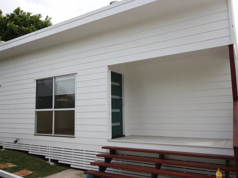 Brand new two bedroom with single carport!