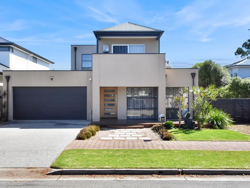 SIMPLY STUNNING AND STYLISH MODERN FOUR BEDROOM HOME WITH HOME OFFICE/THEATRE!