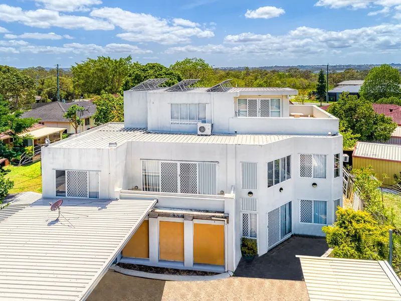 Contemporary - 3 Levels - With Potential!