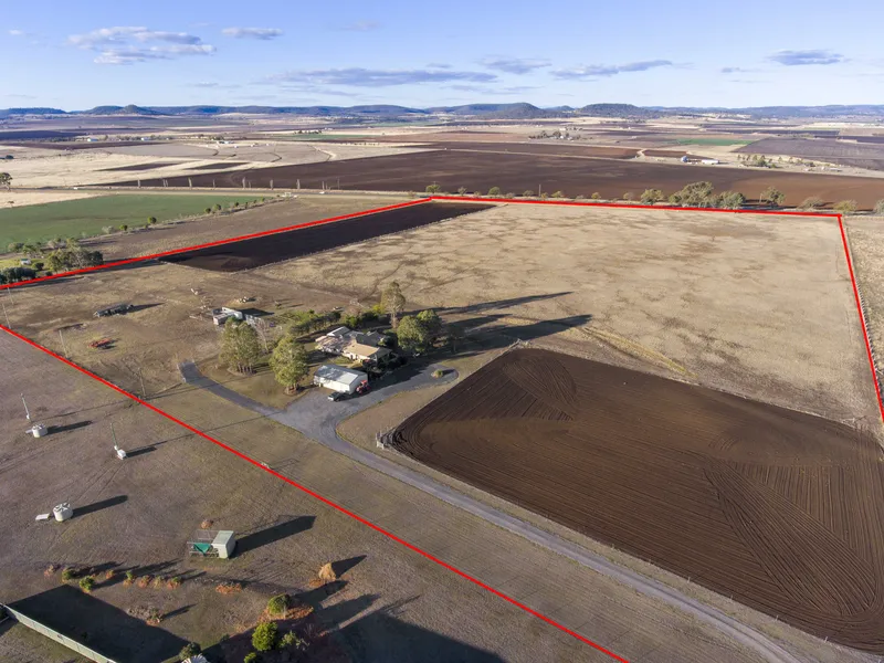 HAVE THE LIFESTYLE  YOU DESERVE WITH THIS 32 ACRE  HOUSE AND ACREAGE  PACKAGE!