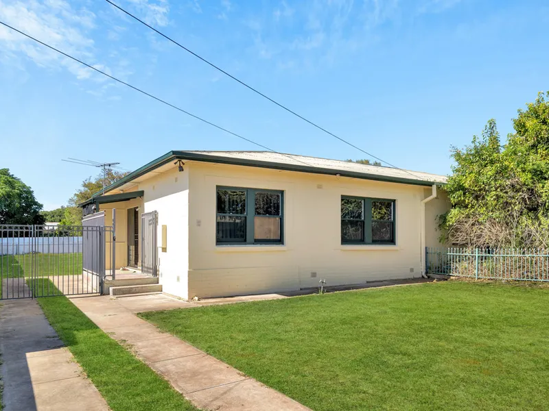 Charming Abode Bursting With Space and Potential