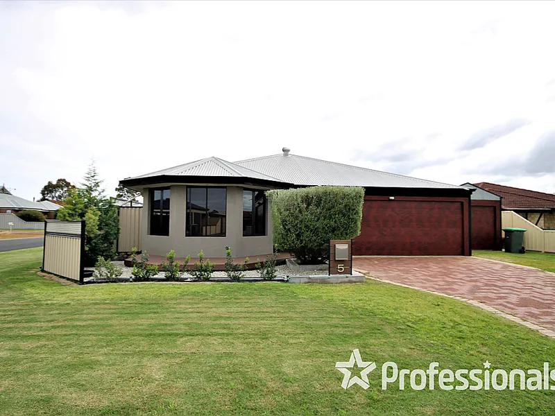 Family Home with extra garaging and workshop