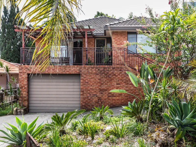 Family home, water glimpses + potential