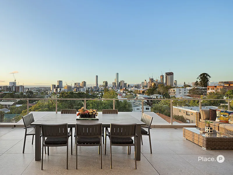 Unparalleled Luxury and Panoramic Views in this Top-Floor Apartment
