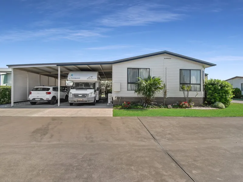 Large corner 2 bedroom home with 2 huge carports - great position.