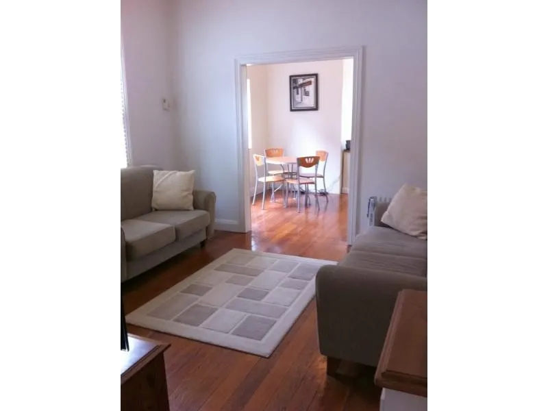 Classic two bedroom, single storey terrace with lush back garden offers a convenient location