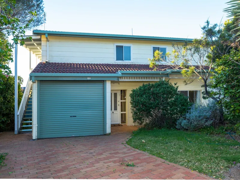 This coastal holiday home offers complete comfort for all guests.