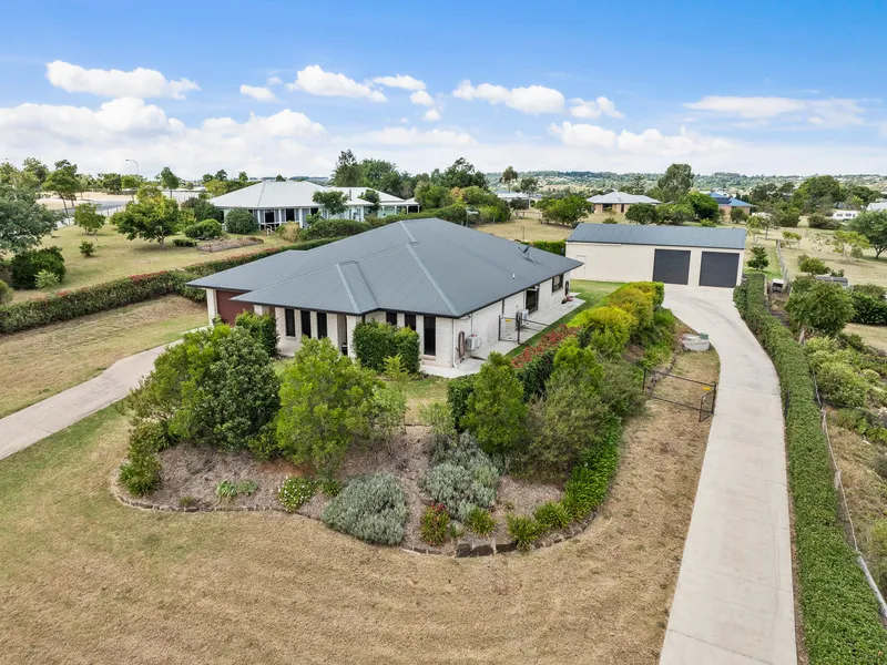 Discover this Large Family Home with HUGE 4-BAY SHED on gently rising allotment. Immaculate!