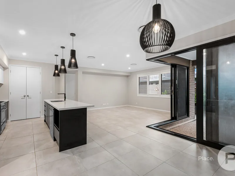 This stylishly appointed home contains all that a family needs!