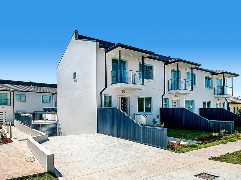 Spacious Townhouse with Basement Parking