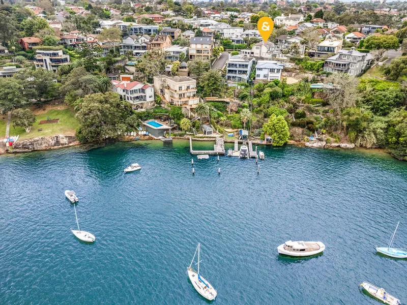 Exclusive waterside living with expansive-boat studded views