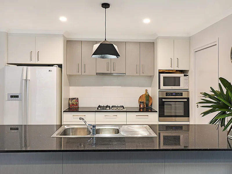 Sophisticated home offering spacious open plan living and blissful views from private, elevated parcel