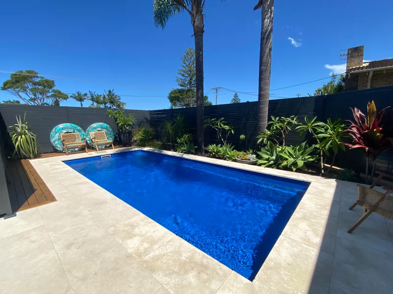 Newly Renovated, inground pool & multiple entertaining areas