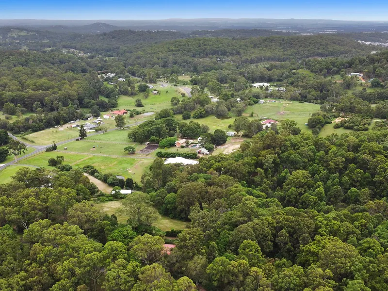25 acre double block with two residences and unlimited potential