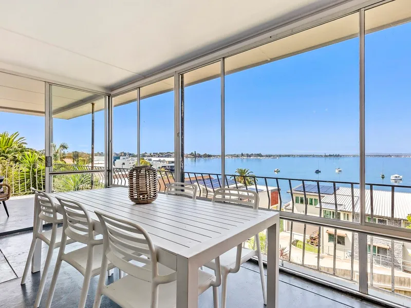 Breathtaking Waterfront Views in Belmont's Best Street!