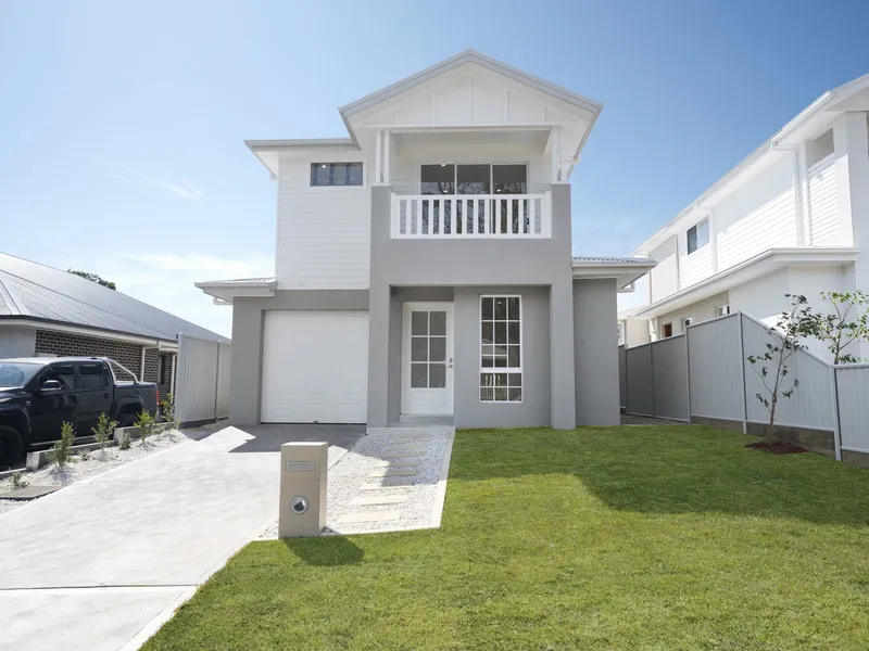 Elegant double-storey hamptons-style home with expansive yard