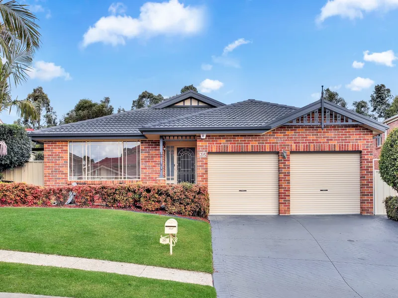 Four-bedroom north facing renovated stunning brick home in the heart of Acacia Gardens