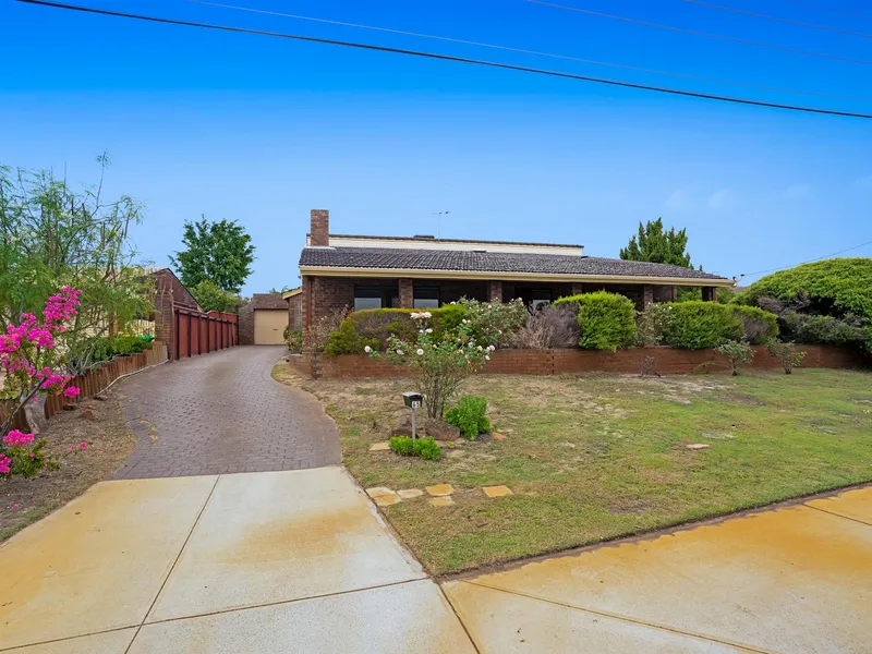 Neat & Tidy Family Home located in the Rossmoyne High School Zone