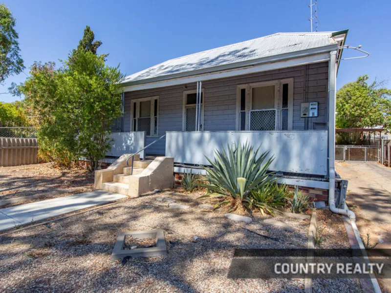 Cottage home on easy care block