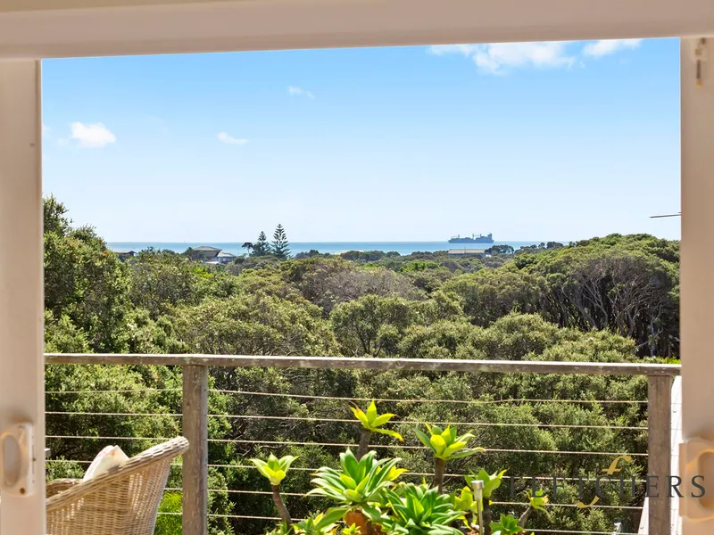 North facing elevation with bay views and easy stroll to beach