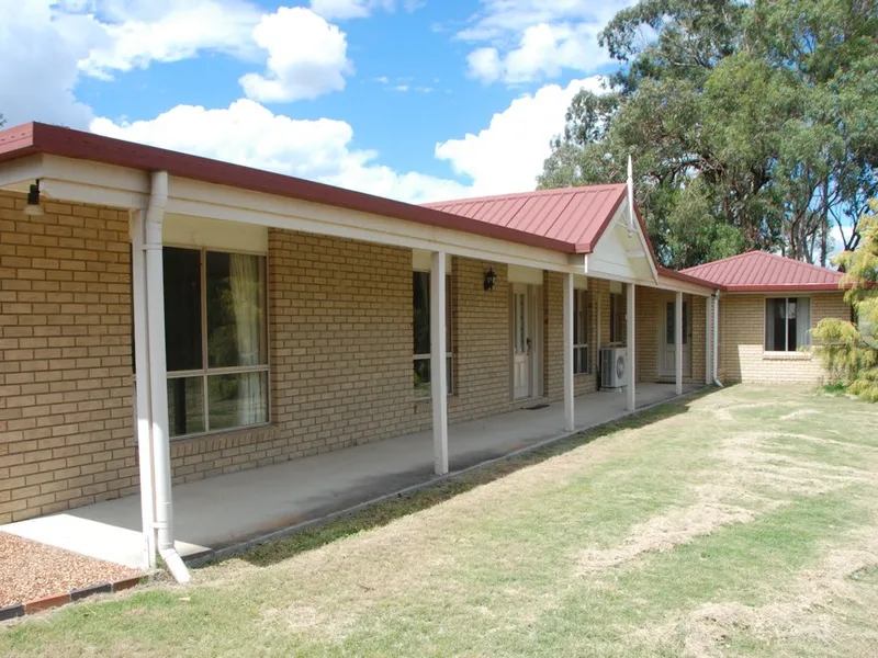 BRICK HOME WITH SUCH A ‘GOOD FEEL’ ON  VERY PRIVATE  2 ACRES 