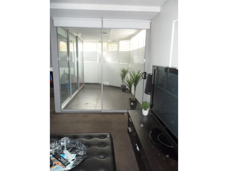 Luxurious large 2 Bed 2 Bath apartment, balcony plus Courtyard and secure parking.