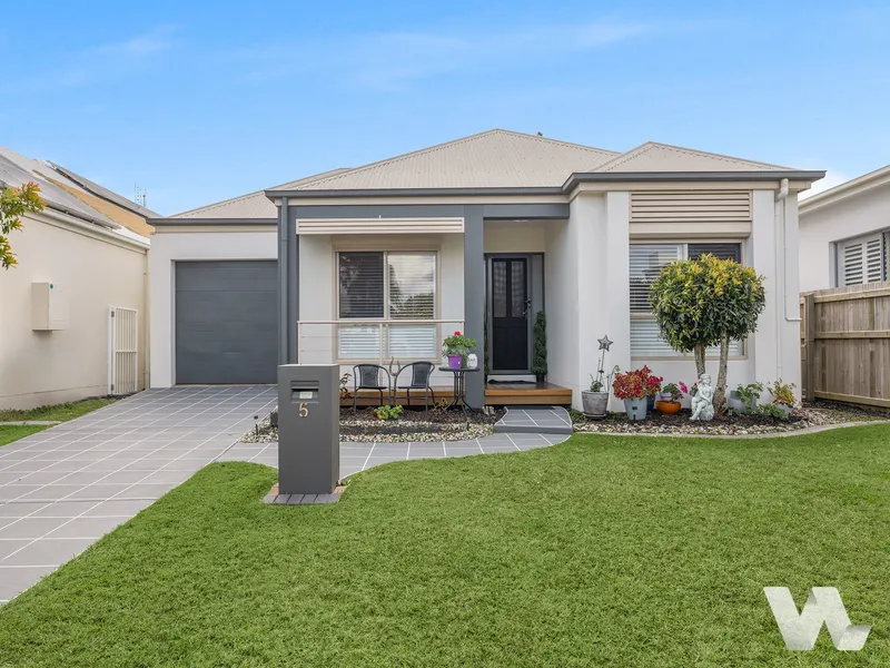 Ultimate Island Living: A Modern Home with Minimal Upkeep!