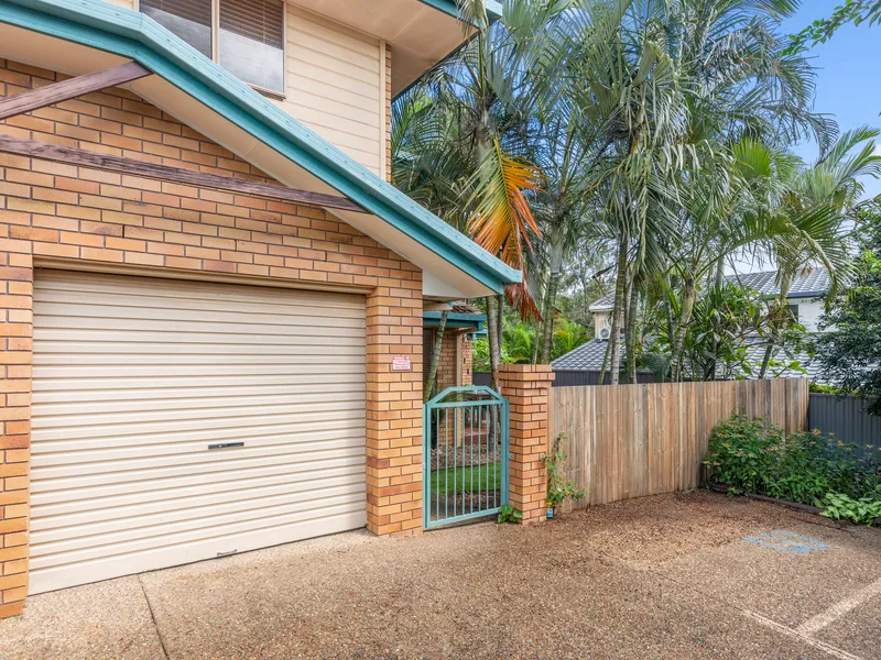 Generous sized triplex with private bush outlook