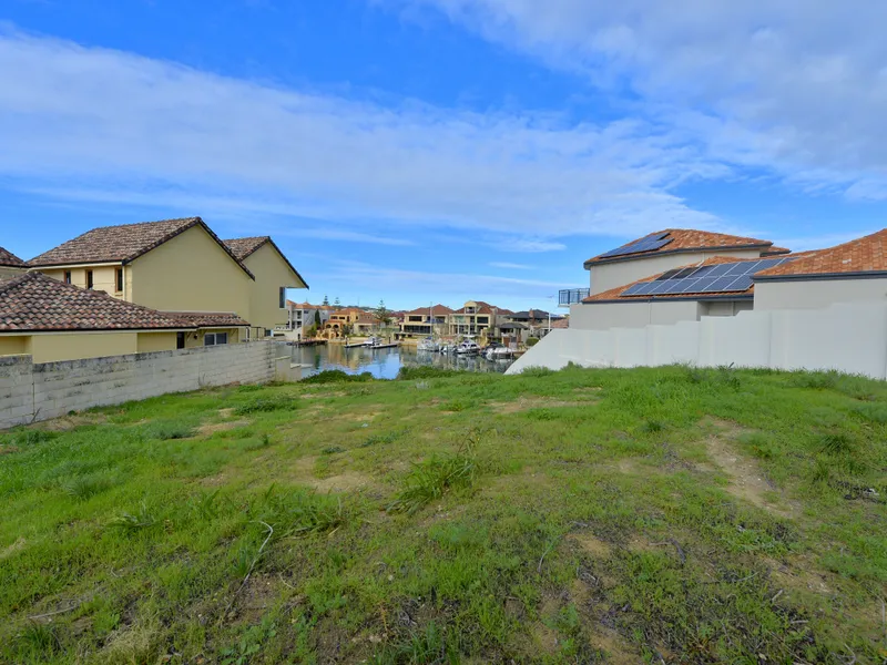 Elevated Canal Lot 200 metres from beach